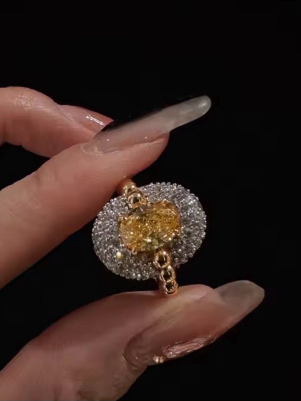 Gold Ring with Yellow Gemstone and Halo Accent